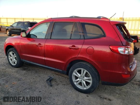 ✅ 2012 Hyundai Santa Fe SE • VIN: 5XYZHDAG9CG108036 • Lot: 75458614. Listed on Copart with 63,718 mi. Free auction sales archive from the USA and detailed vehicle history report at DreamBid. Image 2.