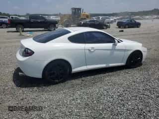 2007 Hyundai Tiburon GT с VIN KMHHN66F17U252700, выставлен на аукционе Copart как лот 62289695 с пробегом 96 467 миль миль и Списание • Salvage title. История ставок и продаж доступна на DreamBid. Изображение 3.
