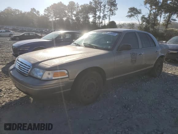 ✅ 2005 Ford Police Interceptor • VIN: 2FAFP71W95X164931 • Lot: 90994005. Listed on Copart with 168,289 mi. Free auction sales archive from the USA and detailed vehicle history report at DreamBid. Image 1.