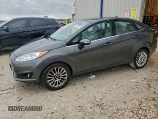 ✅ 2015 Ford Fiesta Titanium • VIN: 3FADP4CJ4FM110781 • Lot: 91611685. Wystawiony na Copart z przebiegiem 108 612 mil. Bezpłatny archiwum sprzedaży aukcyjnych z USA i szczegółowy raport historii pojazdu na DreamBid. Zdjęcie 1.