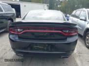 ✅ 2021 Dodge Charger SXT • VIN: 2C3CDXBG9MH584635 • Лот: 43387521. Опубликован ранее на IAAI с пробегом 68 070 миль. Бесплатный доступ к архиву аукционных продаж из США и подробный отчёт об истории автомобиля на DreamBid. Изображение 16.