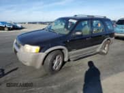 ✅ 2001 Ford Escape XLT • VIN: 1FMYU04181KA03658 • Лот: 90100125. Опубликован ранее на Copart с пробегом 183 859 миль. Бесплатный доступ к архиву аукционных продаж из США и подробный отчёт об истории автомобиля на DreamBid. Изображение 1.