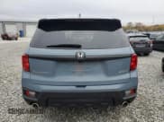 ✅ 2023 Honda Passport EX-L • VIN: 5FNYF8H56PB035007 • Lot: 90318265. Listed on Copart with Not provided. Free auction sales archive from the USA and detailed vehicle history report at DreamBid. Image 6.