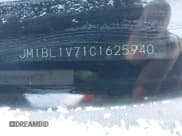 ✅ 2012 Mazda 3 i Touring • VIN: JM1BL1V71C1625940 • Lot: 43659745. Listed on IAAI with 134,863 mi. Free auction sales archive from the USA and detailed vehicle history report at DreamBid. Image 9.