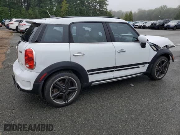 ✅ 2015 MINI Countryman S • VIN: WMWZC5C53FWP48490 • Lot: 81062595. Listed on Copart with 71,414 mi. Free auction sales archive from the USA and detailed vehicle history report at DreamBid. Image 3.