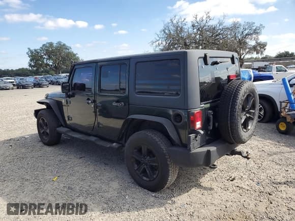 ✅ 2011 Jeep Wrangler Unlimited Sport • VIN: 1J4BA3H15BL565568 • Лот: 90594635. Опубликован ранее на Copart с пробегом 299 329 миль. Бесплатный доступ к архиву аукционных продаж из США и подробный отчёт об истории автомобиля на DreamBid. Изображение 2.