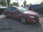 ✅ 2015 Chevrolet Cruze LT • VIN: 1G1PC5SB0F7222385 • Lot: 70261895. Listed on Copart with 145,585 mi. Free auction sales archive from the USA and detailed vehicle history report at DreamBid. Image 4.