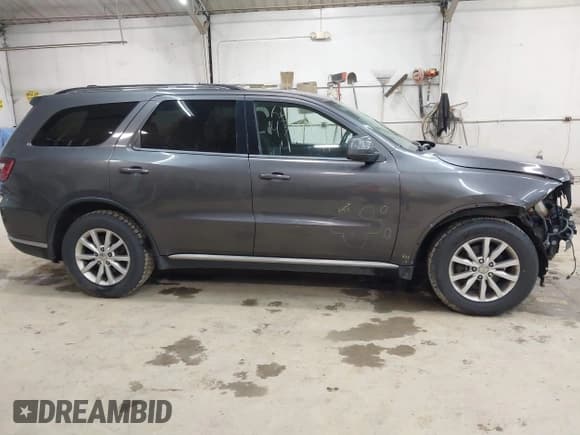 ✅ 2014 Dodge Durango SXT • VIN: 1C4RDJAG5EC292294 • Лот: 43484306. Опубликован ранее на IAAI с пробегом 207 626 миль. Бесплатный доступ к архиву аукционных продаж из США и подробный отчёт об истории автомобиля на DreamBid. Изображение 14.