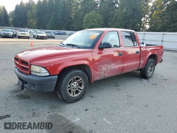 2003 Dodge Dakota Sport with VIN 1D7HL38XX3S275337, listed as a Copart auction lot 80963815 with 274,880 mi miles and Salvage title. Bid and sale history available at DreamBid. Image 1.