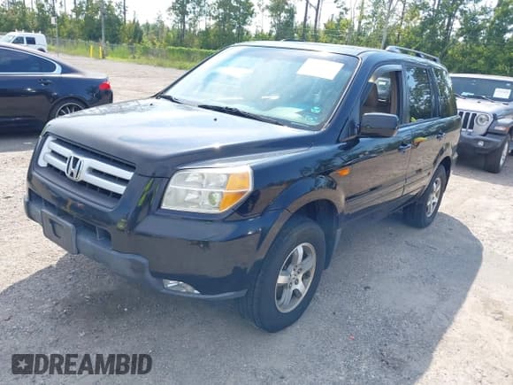 ✅ 2007 Honda Pilot EX-L • VIN: 5FNYF18667B010284 • Lot: 43232259. Listed on IAAI with 370,554 mi. Free auction sales archive from the USA and detailed vehicle history report at DreamBid. Image 2.