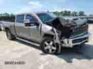 2017 Chevrolet Silverado 2500HD LTZ с VIN 1GC1KWEY4HF156440, выставлен на аукционе Copart как лот 71732905 с пробегом 180 327 миль миль и Списание • Salvage title. История ставок и продаж доступна на DreamBid. Изображение 4.