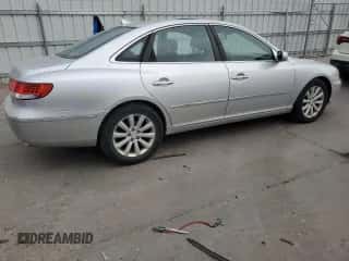 2009 Hyundai Azera GLS с VIN KMHFC46D39A349885, выставлен на аукционе Copart как лот 60717555 с пробегом 172 329 миль миль и Чистый • Clean title. История ставок и продаж доступна на DreamBid. Изображение 3.