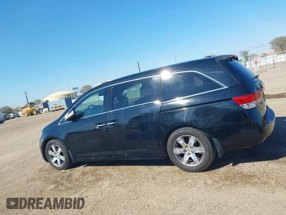 ✅ 2015 Honda Odyssey Touring Elite • VIN: 5FNRL5H96FB062463 • Lot: 43565087. Listed on IAAI with 271,426 mi. Free auction sales archive from the USA and detailed vehicle history report at DreamBid. Image 14.