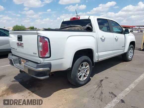 ✅ 2020 GMC Canyon 2WD SLE • VIN: 1GTG5CEN5L1223297 • Лот: 42806221. Опубликован ранее на IAAI с пробегом 120 403 миль. Бесплатный доступ к архиву аукционных продаж из США и подробный отчёт об истории автомобиля на DreamBid. Изображение 4.