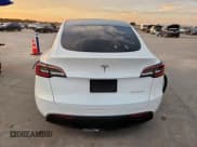 ✅ 2021 Tesla Model Y Long Range • VIN: 5YJYGDEEXMF069943 • Lot: 85187875. Listed on Copart with 48,448 mi. Free auction sales archive from the USA and detailed vehicle history report at DreamBid. Image 6.