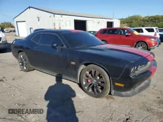 2013 Dodge Challenger SRT-8 z VIN 2C3CDYCJ9DH668163, wystawiony jako Copart lot #86838185 z przebiegiem 94 723 mil mil oraz Czysty tytuł • Clean title. Historia ofert i sprzedaży dostępna na DreamBid. Obrazek 4.