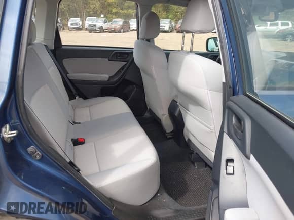 2014 Subaru Forester 2.5i with VIN JF2SJAACXEH439012, listed as a IAAI auction lot 43337376 with 148,553 mi miles and . Bid and sale history available at DreamBid. Image 8.