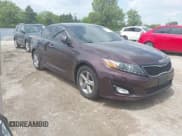 ✅ 2014 Kia Optima LX • VIN: 5XXGM4A7XEG305629 • Lot: 42370105. Listed on IAAI with 240,254 mi. Free auction sales archive from the USA and detailed vehicle history report at DreamBid. Image 1.