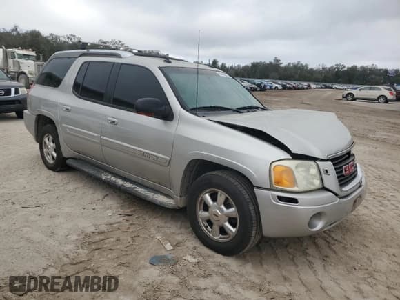 ✅ 2004 GMC Envoy SLE • VIN: 1GKES12S446176853 • Lot: 44468065. Listed on Copart with 204,148 mi. Free auction sales archive from the USA and detailed vehicle history report at DreamBid. Image 4.