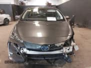 ✅ 2021 Toyota Prius LE • VIN: JTDKAMFP8M3175487 • Lot: 42176936. Listed on IAAI with 78,153 mi. Free auction sales archive from the USA and detailed vehicle history report at DreamBid. Image 12.