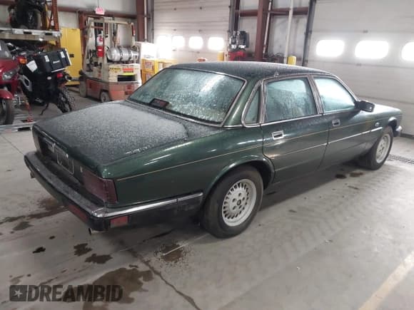 ✅ 1988 Jaguar XJ • VIN: SAJHV1543JC508471 • Lot: 43725231. Listed on IAAI with 80,894 mi. Free auction sales archive from the USA and detailed vehicle history report at DreamBid. Image 4.