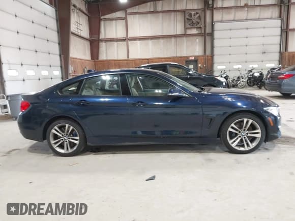 ✅ 2015 BMW 4 Series 428i xDrive • VIN: WBA4A7C53FD414239 • Lot: 42329364. Listed on IAAI with 75,566 mi. Free auction sales archive from the USA and detailed vehicle history report at DreamBid. Image 13.