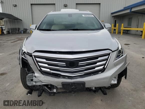 ✅ 2018 Cadillac XT5 AWD • VIN: 1GYKNBRS8JZ220827 • Лот: 69632255. Опубликован ранее на Copart с пробегом 64 651 миль. Бесплатный доступ к архиву аукционных продаж из США и подробный отчёт об истории автомобиля на DreamBid. Изображение 5.