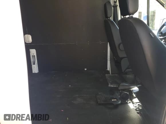 ✅ 2024 Ford Transit Cargo • VIN: 1FTBR1C87RKB33457 • Lot: 49390855. Listed on Copart with 5,893 mi. Free auction sales archive from the USA and detailed vehicle history report at DreamBid. Image 10.