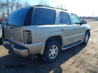 ✅ 2002 GMC Yukon Denali • VIN: 1GKEK63UX2J323023 • Lot: 43787393. Listed on IAAI with 184,795 mi. Free auction sales archive from the USA and detailed vehicle history report at DreamBid. Image 4.