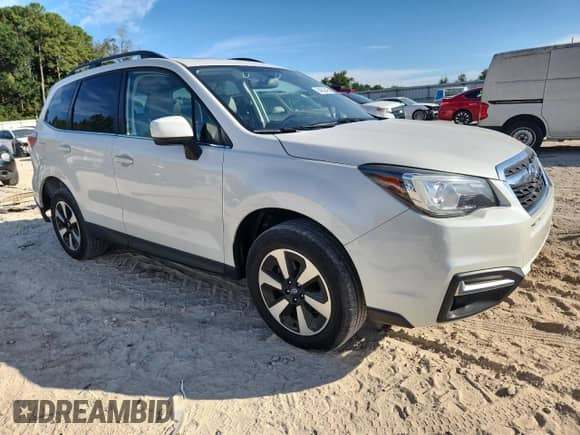 2017 Subaru Forester Limited with VIN JF2SJARCXHH523100, listed as a Copart auction lot 84559495 with 94,988 mi miles and Salvage title. Bid and sale history available at DreamBid. Image 4.
