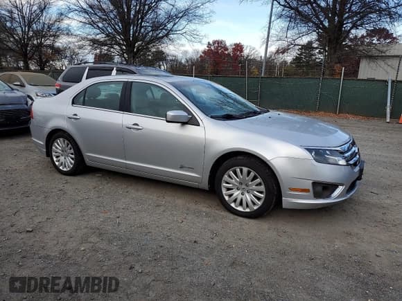 ✅ 2012 Ford Fusion Hybrid • VIN: 3FADP0L30CR243515 • Lot: 92265305. Listed on Copart with 62,142 mi. Free auction sales archive from the USA and detailed vehicle history report at DreamBid. Image 4.