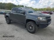 ✅ 2018 Chevrolet Colorado 4WD ZR2 • VIN: 1GCPTEE11J1194070 • Lot: 52037025. Listed on Copart with 104,858 mi. Free auction sales archive from the USA and detailed vehicle history report at DreamBid. Image 4.