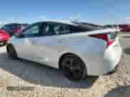 2021 Toyota Prius L Eco with VIN JTDKAMFU5M3127192, listed as a Copart auction lot 80371565 with 77,510 mi miles and Salvage title. Bid and sale history available at DreamBid. Image 2.