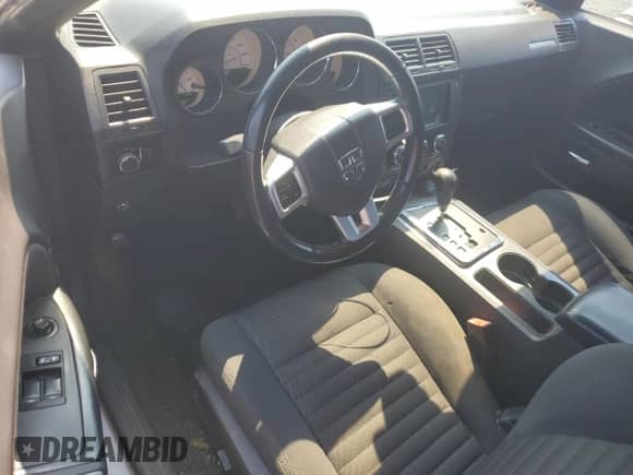 2011 Dodge Challenger z VIN 2B3CJ4DG1BH510091, wystawiony jako Copart lot #68977814 z przebiegiem 176 711 mil mil oraz Szkoda całkowita • Salvage title. Historia ofert i sprzedaży dostępna na DreamBid. Obrazek 8.