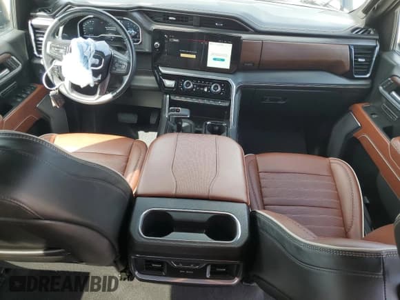 ✅ 2023 GMC Sierra 1500 Denali Ultimate • VIN: 1GTUUHEL6PZ239985 • Лот: 71516055. Опубликован ранее на Copart с пробегом 28 710 миль. Бесплатный доступ к архиву аукционных продаж из США и подробный отчёт об истории автомобиля на DreamBid. Изображение 8.