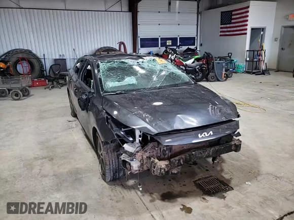 ✅ 2023 Kia Forte LXS • VIN: 3KPF24AD0PE533383 • Лот: 91154545. Опубликован ранее на Copart с пробегом 26 087 миль. Бесплатный доступ к архиву аукционных продаж из США и подробный отчёт об истории автомобиля на DreamBid. Изображение 13.