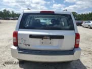 ✅ 2008 Jeep Patriot Sport • VIN: 1J8FT28078D601033 • Lot: 66777215. Listed on Copart with 121,535 mi. Free auction sales archive from the USA and detailed vehicle history report at DreamBid. Image 6.