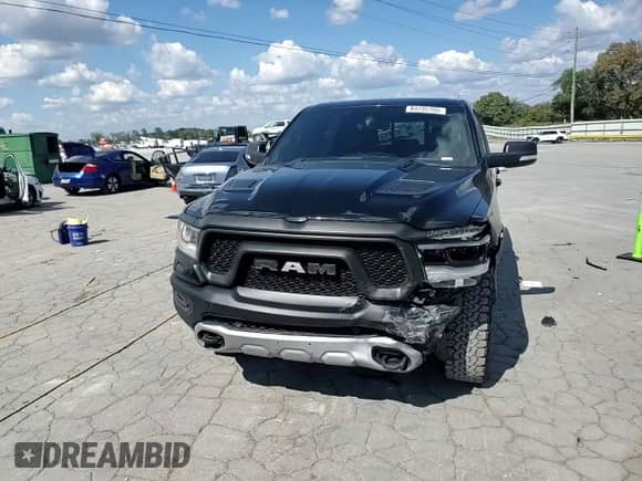 2020 Ram 1500 Rebel z VIN 1C6SRFLM2LN271477, wystawiony jako Copart lot #84295705 z przebiegiem 116 217 mil mil oraz Szkoda całkowita • Salvage title. Historia ofert i sprzedaży dostępna na DreamBid. Obrazek 14.