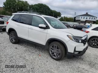 ✅ 2023 Honda Passport EX-L • VIN: 5FNYF8H58PB015048 • Lot: 66259043. Listed on Copart with 7,142 mi. Free auction sales archive from the USA and detailed vehicle history report at DreamBid. Image 4.