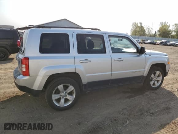 ✅ 2013 Jeep Patriot Sport • VIN: 1C4NJRAB5DD169856 • Lot: 74664024. Listed on Copart with 183,073 mi. Free auction sales archive from the USA and detailed vehicle history report at DreamBid. Image 3.