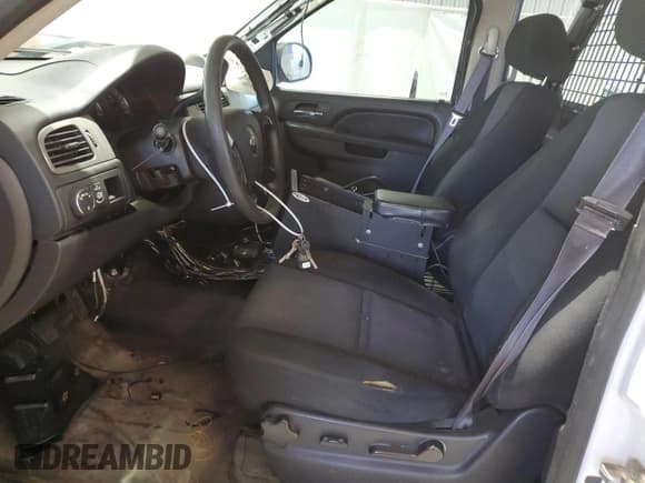 ✅ 2014 Chevrolet Tahoe Commercial • VIN: 1GNLC2E07ER194822 • Lot: 47253625. Listed on Copart with 126,882 mi. Free auction sales archive from the USA and detailed vehicle history report at DreamBid. Image 7.