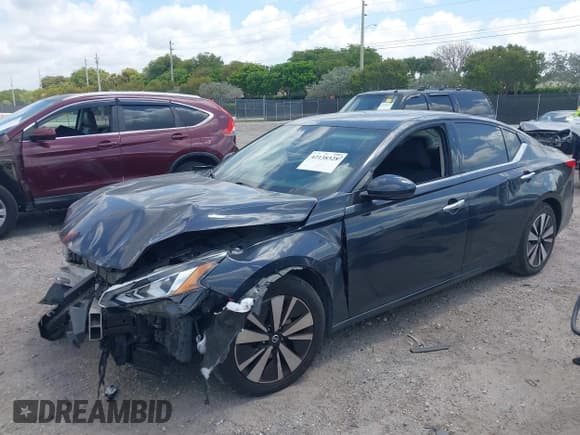 ✅ 2019 Nissan Altima SV • VIN: 1N4BL4DV2KC128311 • Lot: 42138328. Listed on IAAI with 94,873 mi. Free auction sales archive from the USA and detailed vehicle history report at DreamBid. Image 17.