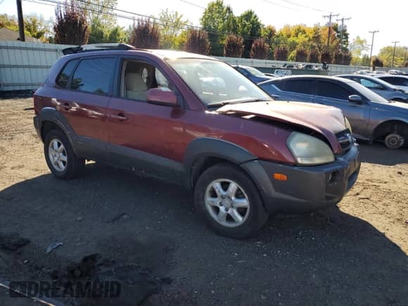 2005 Hyundai Tucson GLS z VIN KM8JN12D75U112964, wystawiony jako Copart lot #75042354 z przebiegiem 77 827 mil mil oraz Szkoda całkowita • Salvage title. Historia ofert i sprzedaży dostępna na DreamBid. Obrazek 4.