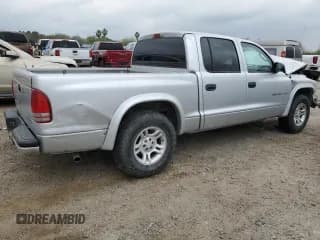 ✅ 2002 Dodge Dakota Sport • VIN: 1B7HL38XX2S522333 • Lot: 44639795. Wystawiony na Copart z przebiegiem 237 644 mil. Bezpłatny archiwum sprzedaży aukcyjnych z USA i szczegółowy raport historii pojazdu na DreamBid. Zdjęcie 3.
