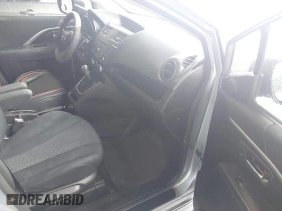 ✅ 2012 Mazda 5 Touring • VIN: JM1CW2CL1C0131939 • Lot: 43552511. Listed on IAAI with 171,138 mi. Free auction sales archive from the USA and detailed vehicle history report at DreamBid. Image 5.