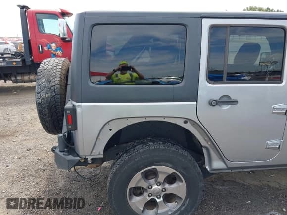 ✅ 2017 Jeep Wrangler Unlimited Sahara • VIN: 1C4BJWEGXHL552971 • Lot: 42610103. Listed on IAAI with 87,530 mi. Free auction sales archive from the USA and detailed vehicle history report at DreamBid. Image 19.