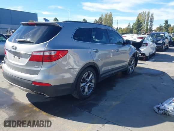 2015 Hyundai Santa Fe Limited z VIN KM8SR4HF6FU099631, wystawiony jako IAAI lot #43541205 z przebiegiem 209 264 mil mil oraz . Historia ofert i sprzedaży dostępna na DreamBid. Obrazek 4.