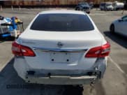 ✅ 2018 Nissan Sentra S • VIN: 3N1AB7AP9JY271927 • Lot: 61014035. Wystawiony na Copart z przebiegiem 96 242 mil. Bezpłatny archiwum sprzedaży aukcyjnych z USA i szczegółowy raport historii pojazdu na DreamBid. Zdjęcie 6.