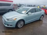 ✅ 2014 Ford Fusion Titanium Hybrid • VIN: 3FA6P0RU8ER350016 • Lot: 43532622. Listed on IAAI with 87,458 mi. Free auction sales archive from the USA and detailed vehicle history report at DreamBid. Image 2.