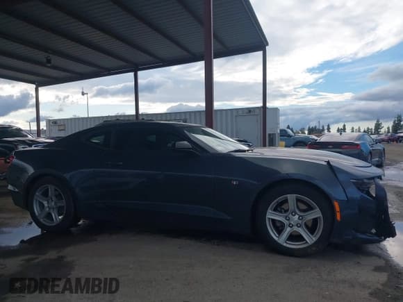 ✅ 2022 Chevrolet Camaro 1LT • VIN: 1G1FB1RX2N0120229 • Lot: 43726596. Listed on IAAI with 53,146 mi. Free auction sales archive from the USA and detailed vehicle history report at DreamBid. Image 14.